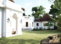 The house is set in seven acres of lushly planted grounds.